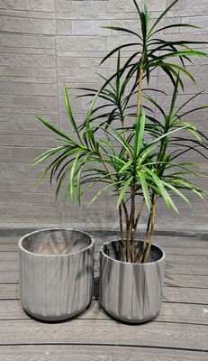 Beli Fiber Clay Planter Bulat Karakter tahan es untuk kebutuhan Anda online manufacture